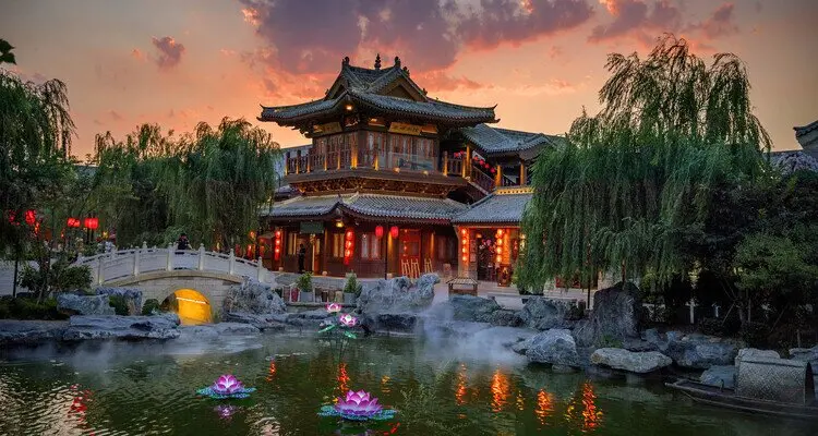 an ancient garden at night