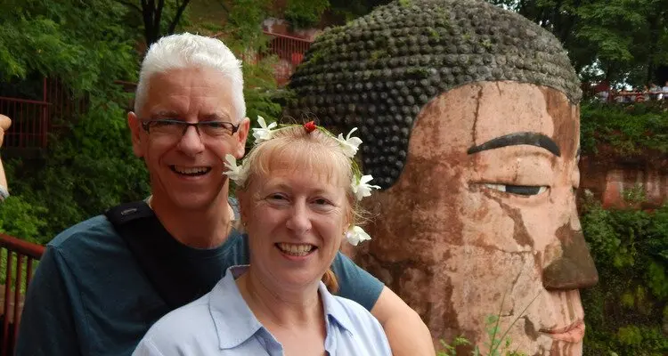 a couple with the Buddha's head