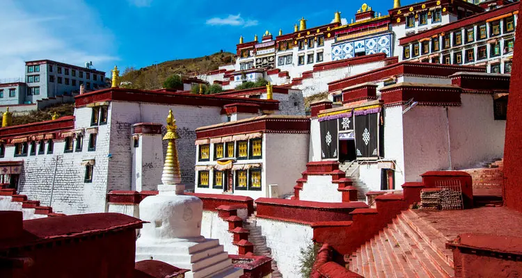 The white and red buildings of Ganden Monastery