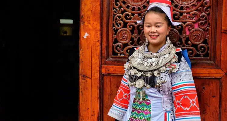 a girl with the red traditional dress