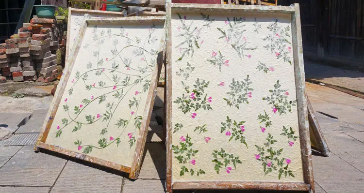 hand-made paper with flowers and leaves