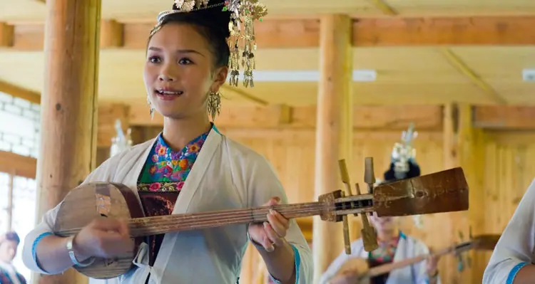 a dong girl playing an instrument