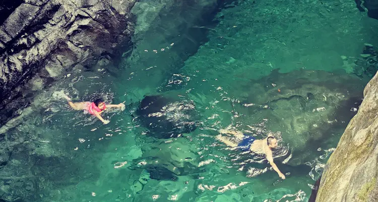 Swimming in a natural pool