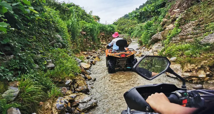 Drive an ATV in a stream
