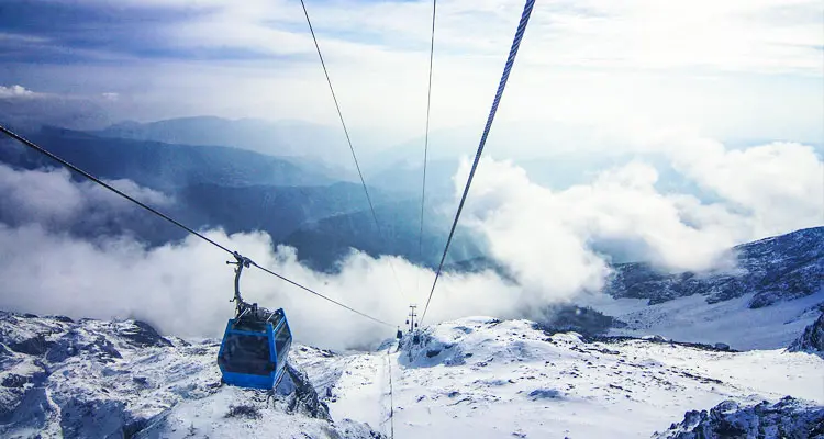 Take a cable car to the snow-capped zone of Jade Dragon Snow Mountain