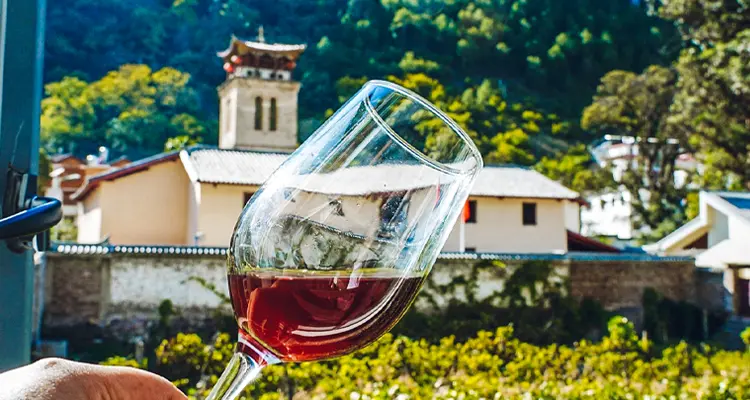 Taste a glass of wine made from rose honey grapes