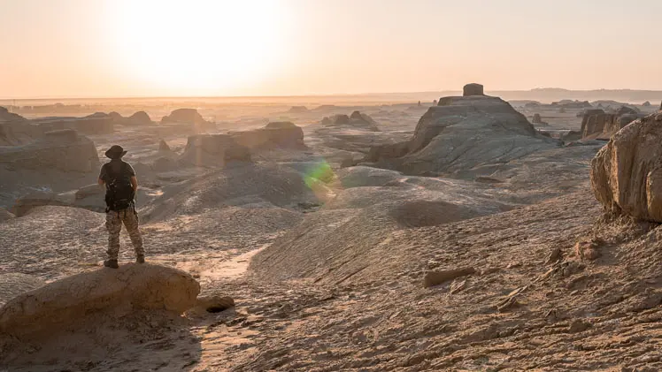 A man on the rock in the Ghost City