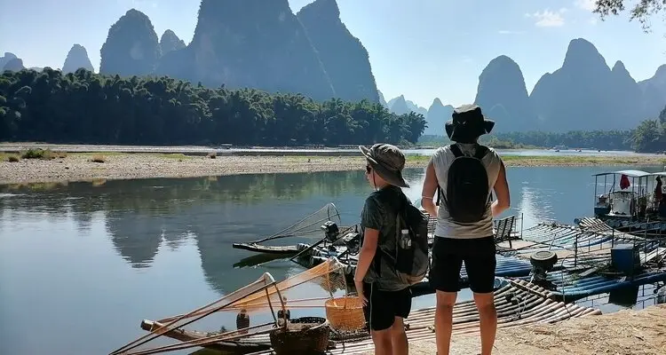 admire the li river sunset and watch cormorant fishing