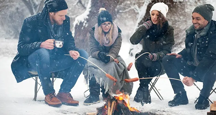 have a BBQ in snowy forest
