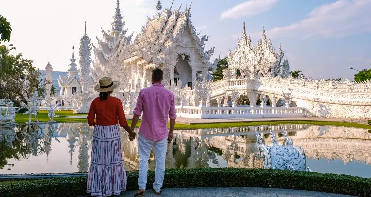 white temple and a couple