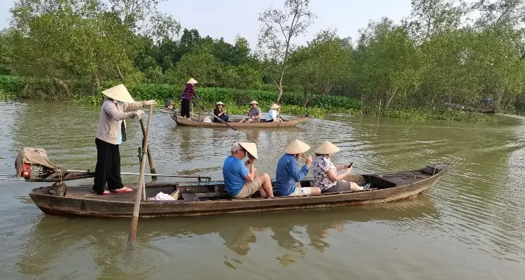 a sampan canal ride in mekong delta