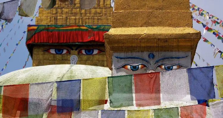 the white pagoda and the colorful flags